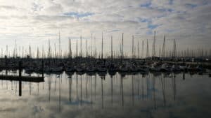 Reflection of boats in the water in La Rochelle, France