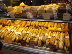 Baguette sandwiches all lined up in display 