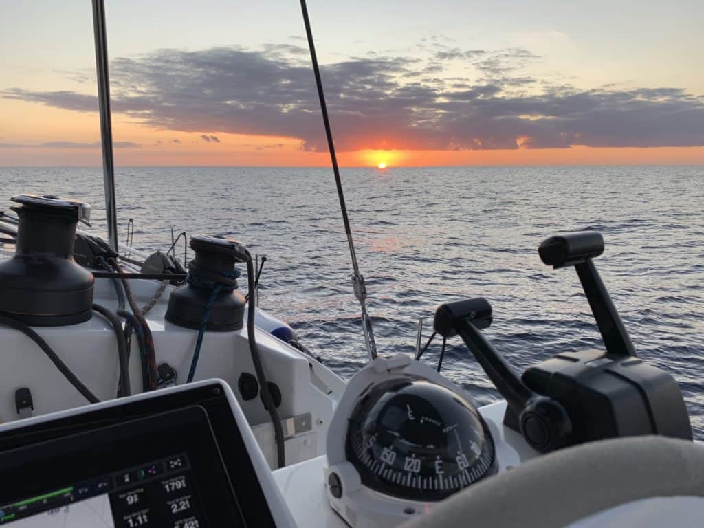 Sunrise over the helm of Sea Odyssey